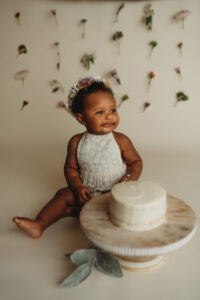 baby eating cake for first birthday cake smash in dover pa photographer studio